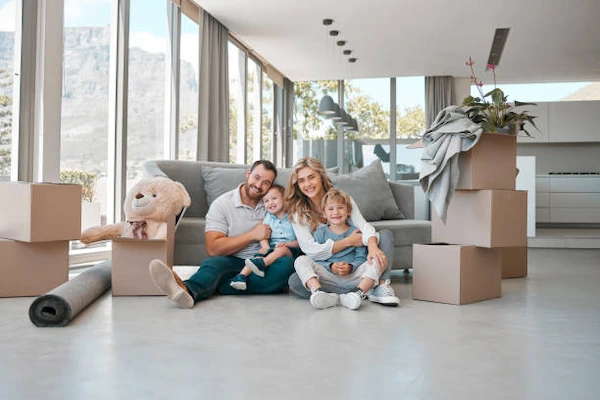 Family organizing home relocation with moving checklist